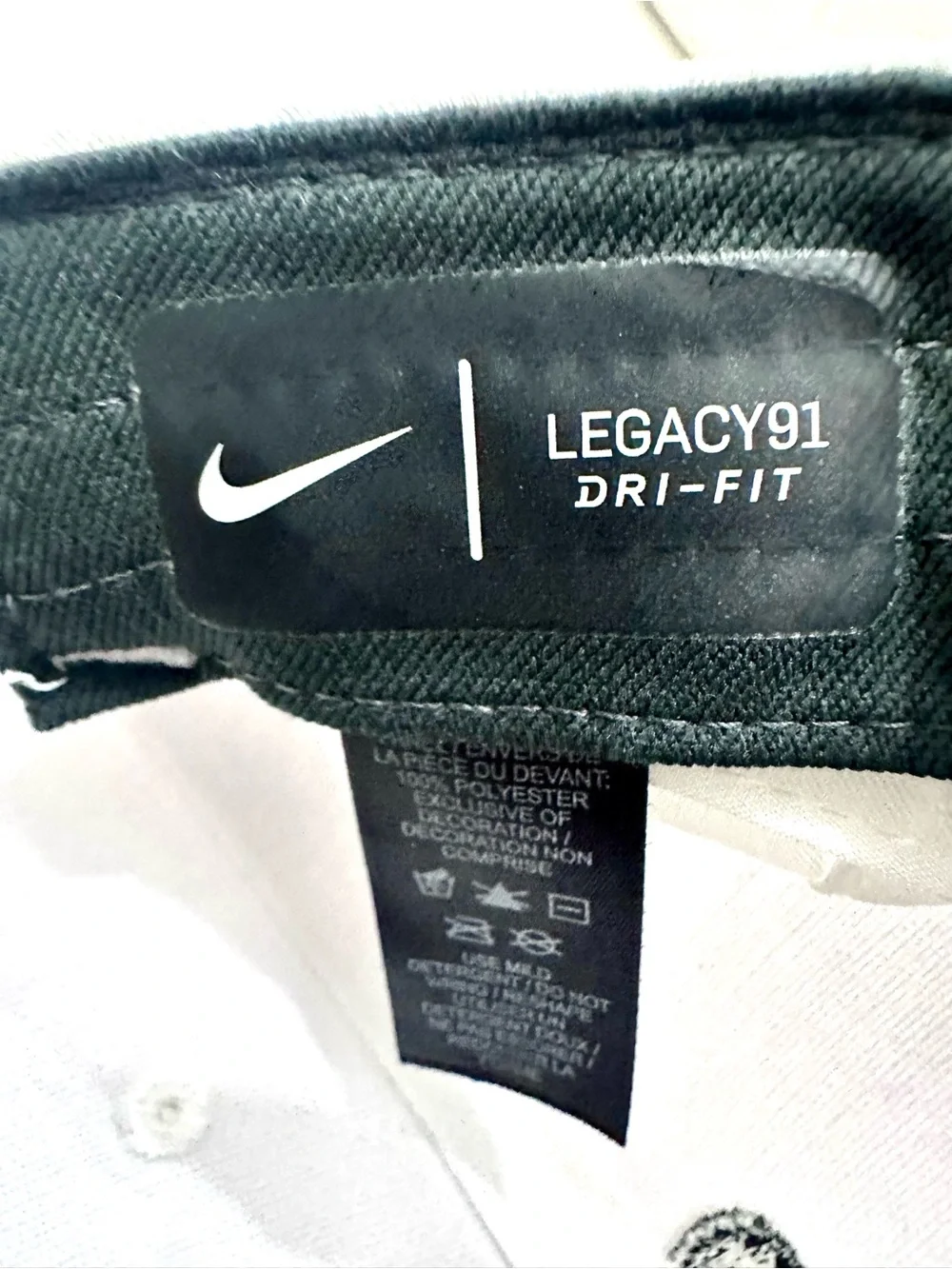Nike White Baseball Cap with Black Embroidered Character